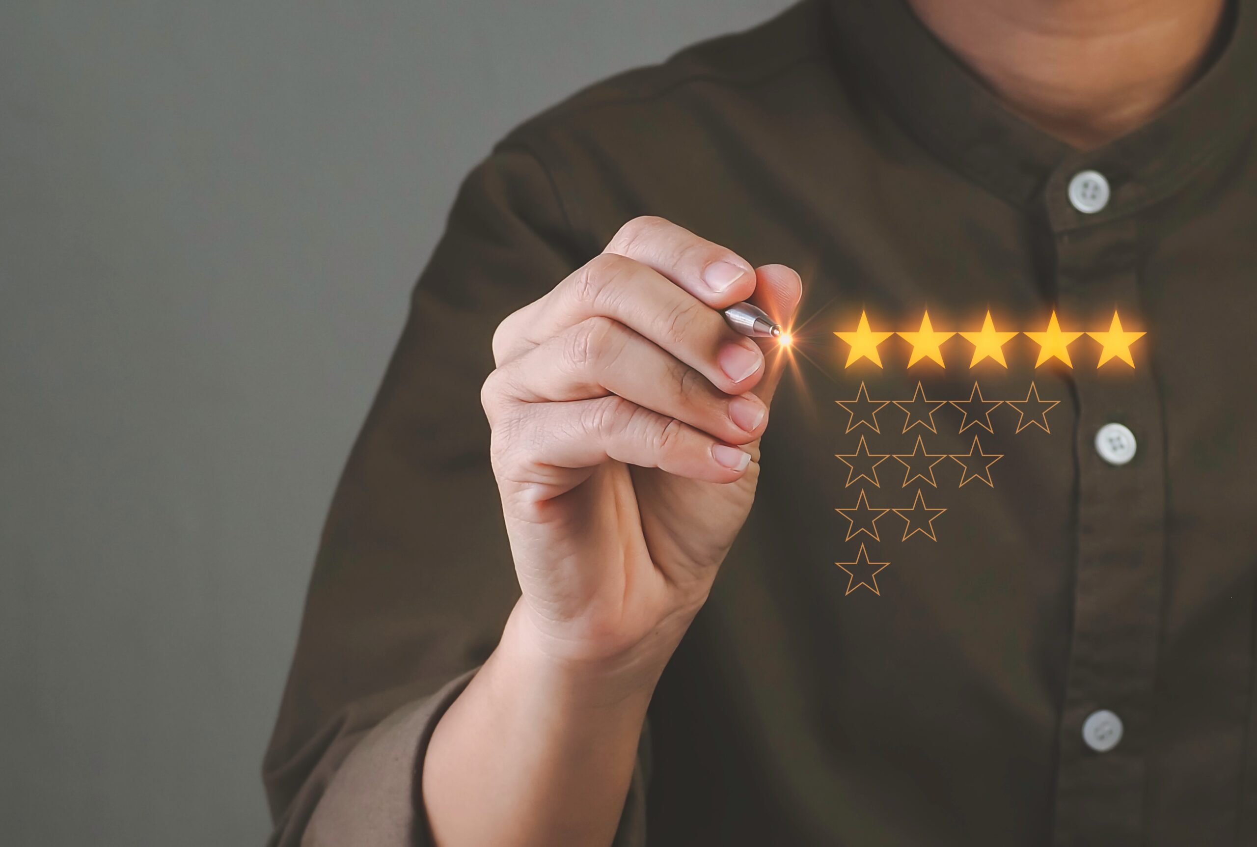 a man marking a 5 star review